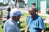 Everett Ehda, during his retirement party on Saturday (July 20) talks with a friend. Ehda spent 10 years as the Hanford Airport manager.